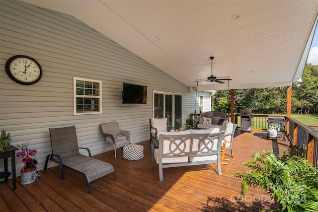 deck with area for grilling, ceiling fan, and outdoor lounge area