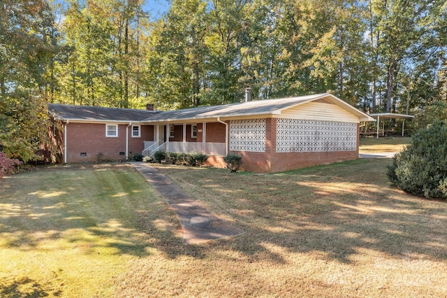 single story home featuring covered porch and a front yard