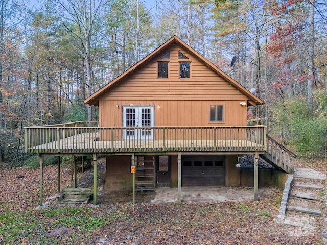 rear view of house featuring a deck