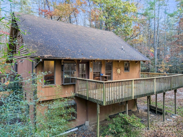 rear view of house with a deck