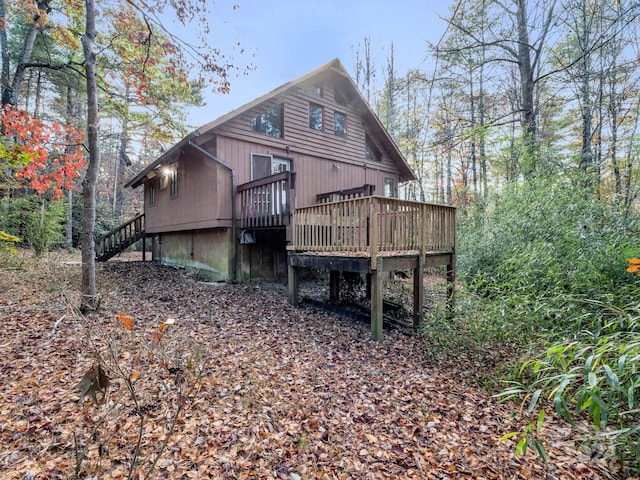 rear view of house with a deck