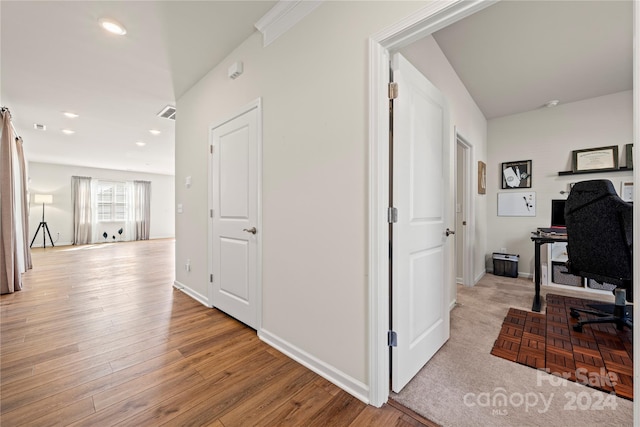 office area with light hardwood / wood-style floors