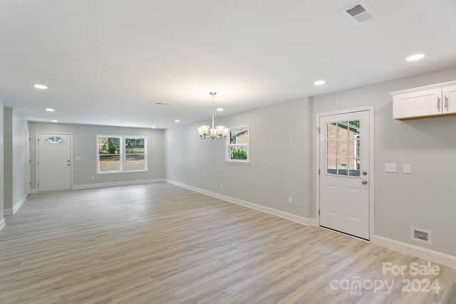545 Shamel Ct, Winston Salem, NC 27105 - unfurnished dining area with plenty of natural light, a chandelier, light wood finished floors, and recessed lighting