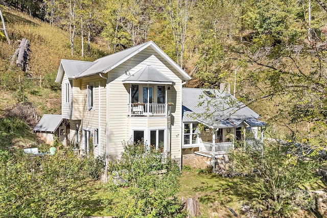 3942 Anderson Branch Rd, Marshall, NC 28753 - rear view of property with a balcony, metal roof, a forest view, and french doors
