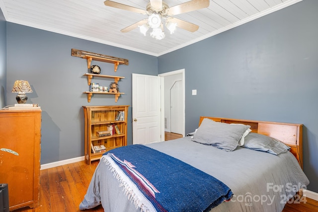 3942 Anderson Branch Rd, Marshall, NC 28753 - bedroom featuring wood finished floors, baseboards, crown molding, and ceiling fan