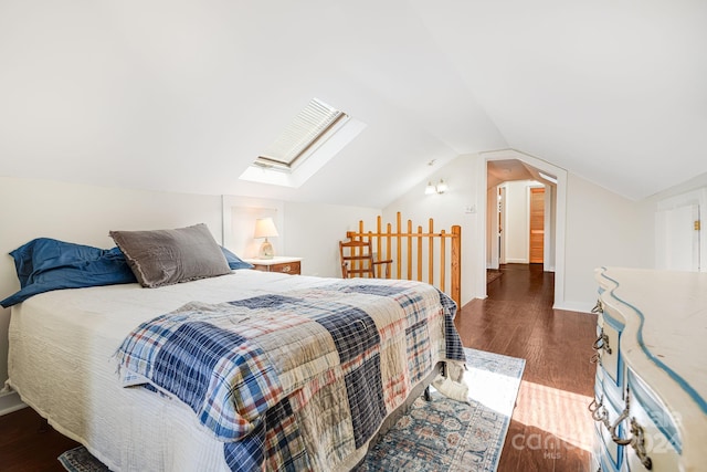 3942 Anderson Branch Rd, Marshall, NC 28753 - bedroom with wood finished floors, vaulted ceiling, a skylight, and baseboards