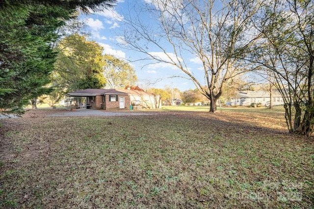 view of yard featuring a carport