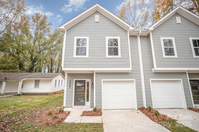 9247 Eleanor Dr, Charlotte, NC 28214 - view of front facade featuring a garage and driveway