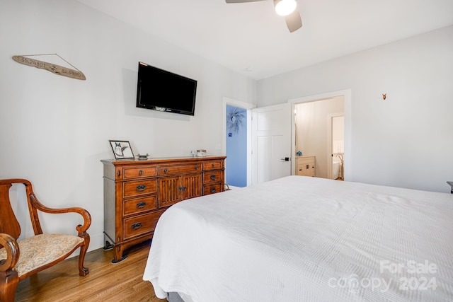 bedroom featuring a closet, light wood-type flooring, and ceiling fan