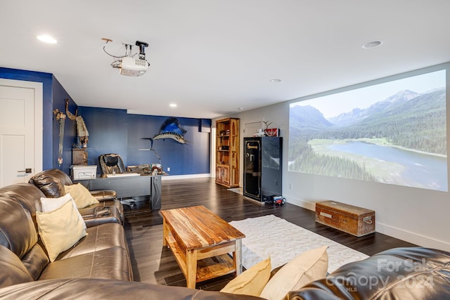 living room with dark wood-type flooring and a mountain view