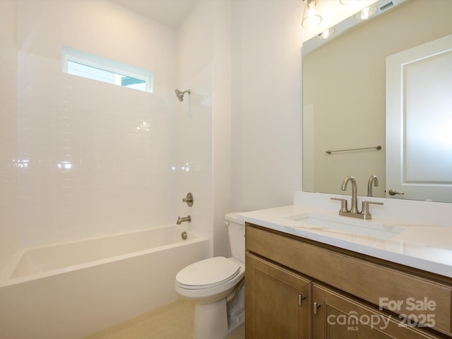 full bathroom with vanity, bathing tub / shower combination, and toilet