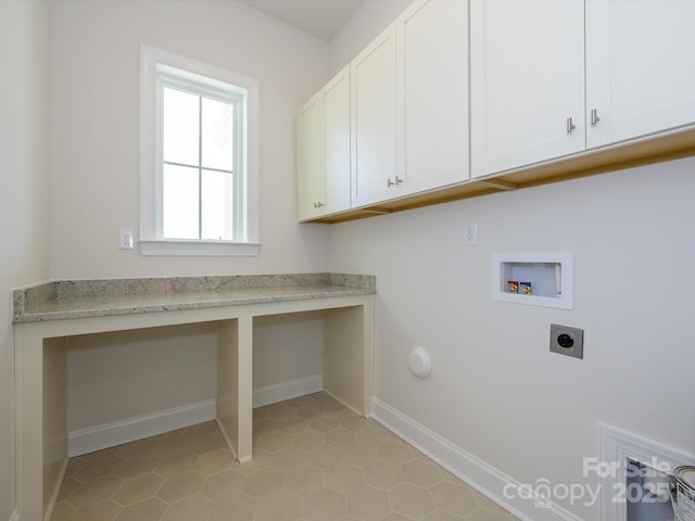 laundry area featuring cabinets, washer hookup, and electric dryer hookup