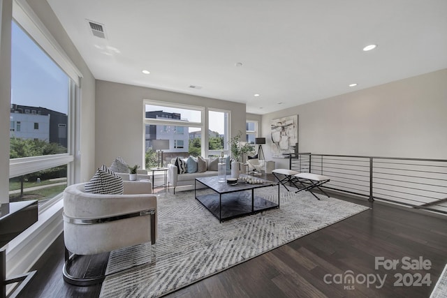 living room featuring dark hardwood / wood-style floors