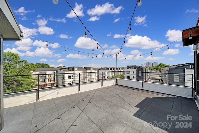 view of patio / terrace with a balcony