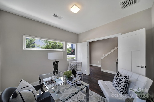 living room featuring dark hardwood / wood-style floors