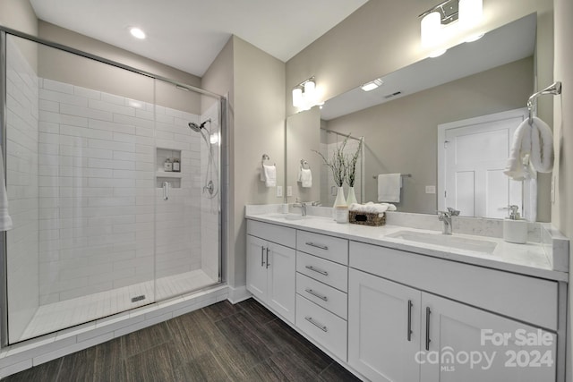 bathroom with vanity and walk in shower