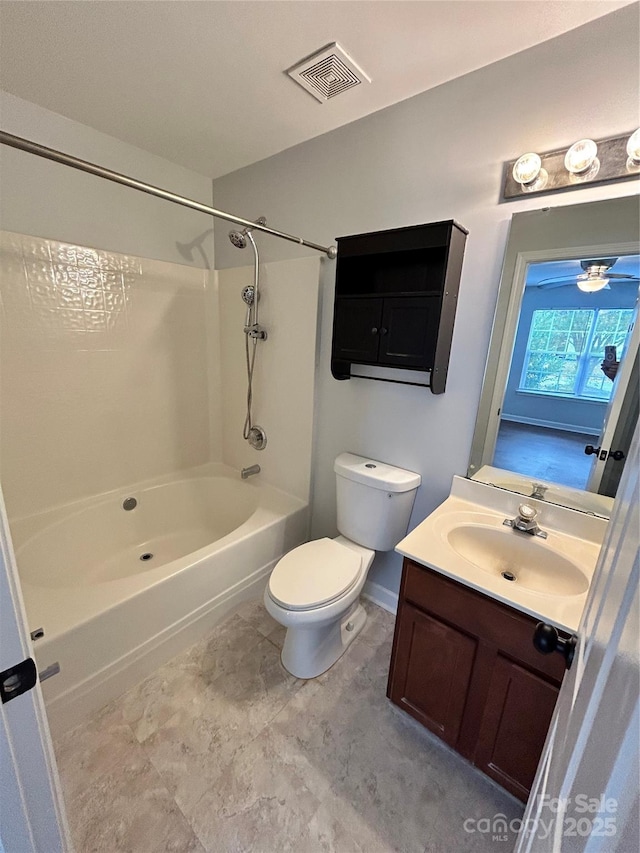 full bathroom featuring shower / bathing tub combination, vanity, and toilet