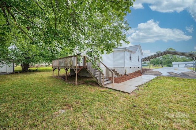 rear view of house featuring a shed, a deck, and a lawn