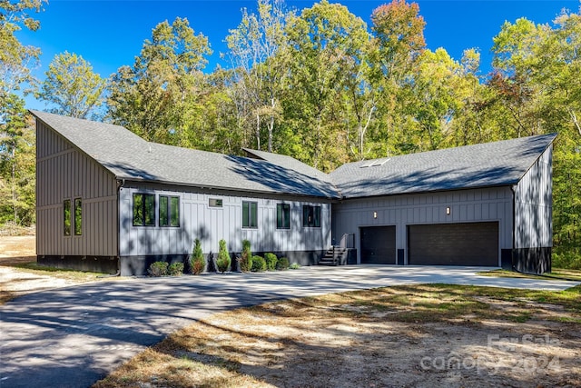 view of front of home with a garage