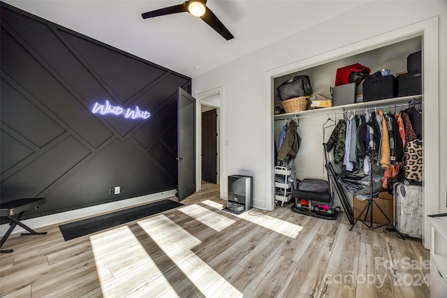 bedroom featuring a closet, ceiling fan, and light hardwood / wood-style floors