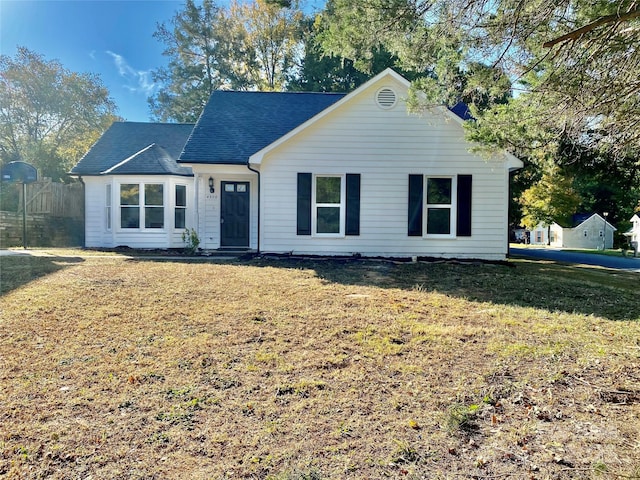 view of front of property with a front lawn