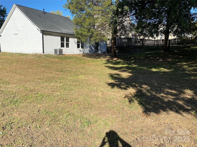 view of yard with central AC unit