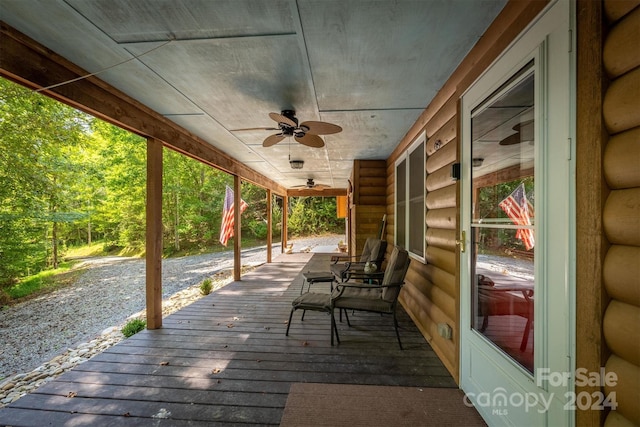 wooden terrace with ceiling fan