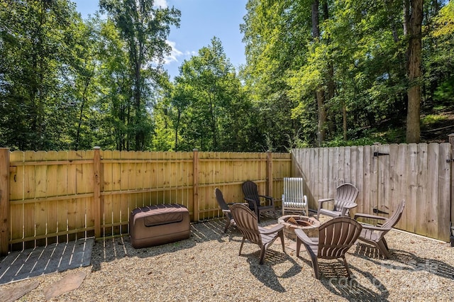 view of patio / terrace with an outdoor fire pit