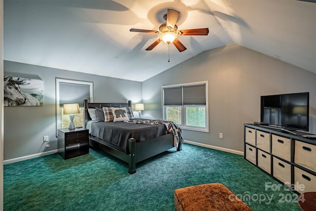 carpeted bedroom featuring ceiling fan and vaulted ceiling