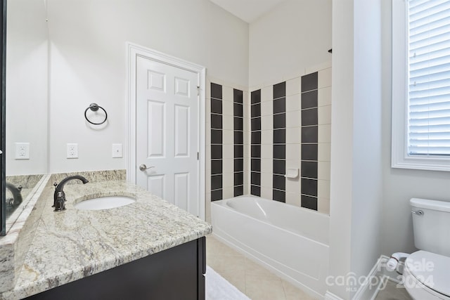 full bathroom featuring toilet, vanity, tile patterned floors, and independent shower and bath