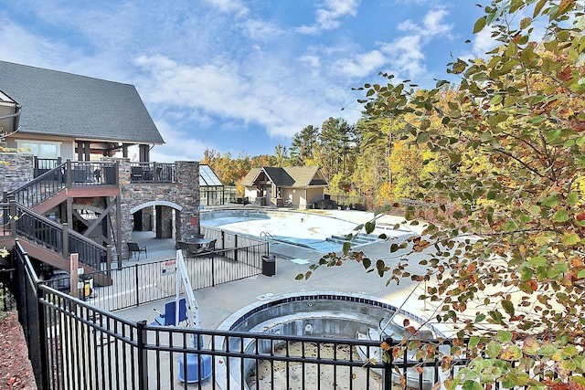 view of pool featuring a patio