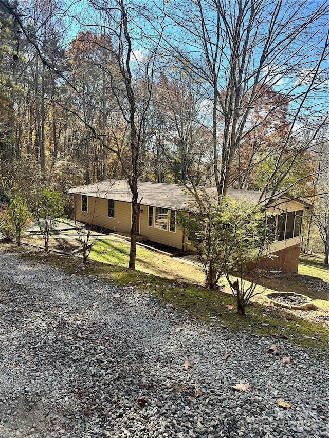 view of front of home with a sunroom