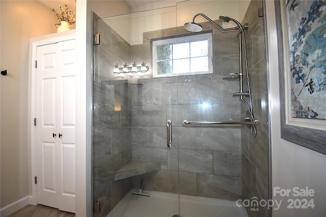 bathroom with an enclosed shower