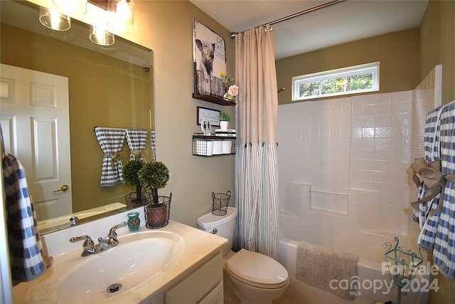 full bathroom featuring vanity, toilet, and shower / bath combo