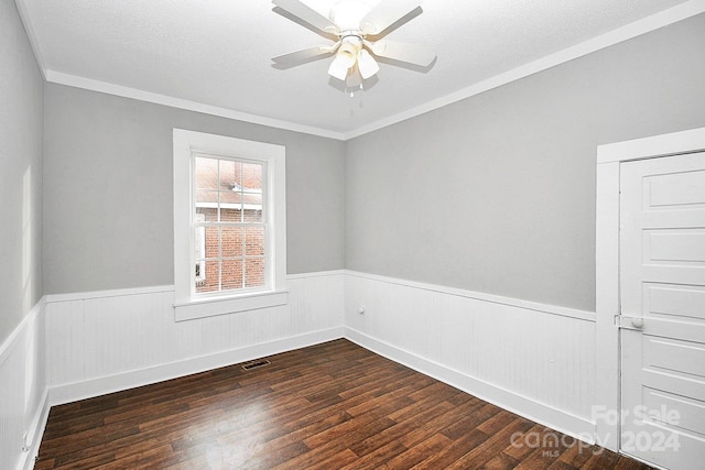 unfurnished room with dark wood-type flooring, ceiling fan, crown molding, and a textured ceiling