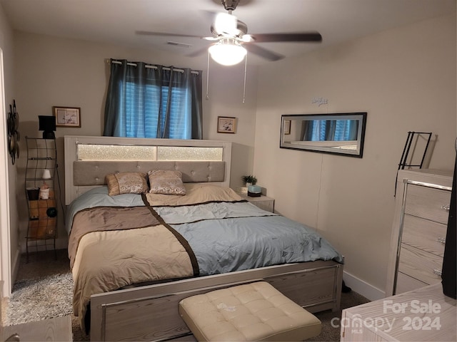 carpeted bedroom with ceiling fan