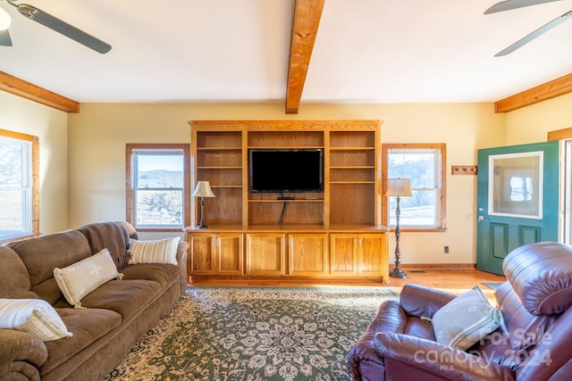 200 Bp Tree Farm Ln, Sparta, NC 28675 - living area featuring ceiling fan, beam ceiling, light wood finished floors, and baseboards