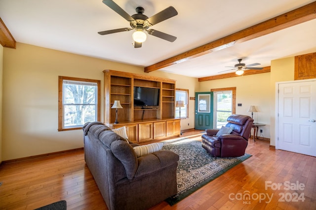 200 Bp Tree Farm Ln, Sparta, NC 28675 - living area featuring ceiling fan, beamed ceiling, light wood finished floors, and baseboards