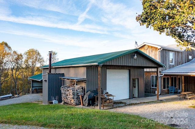 view of outdoor structure with a garage