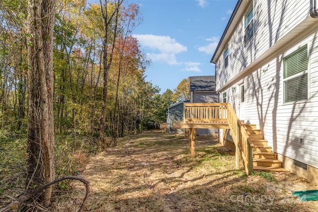 view of yard with a deck