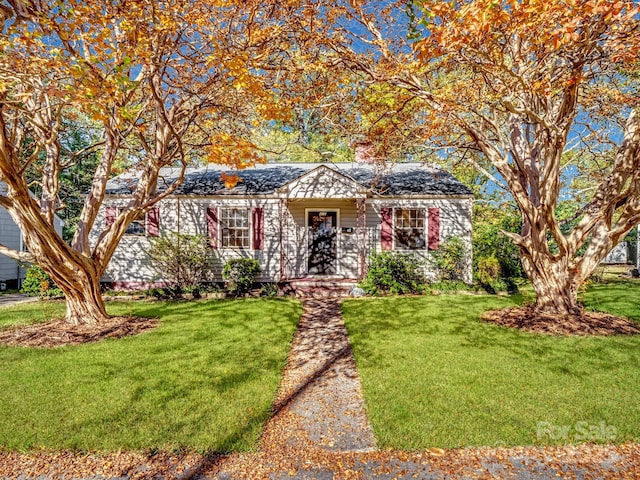 view of front of home with a front yard