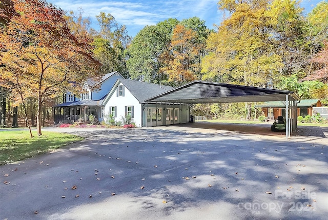 exterior space featuring a carport