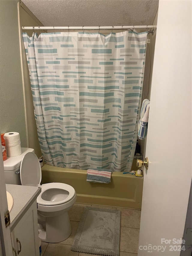 full bathroom with vanity, toilet, and shower / bath combo