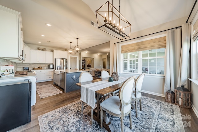 dining space with light hardwood / wood-style flooring