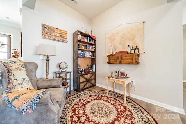 living area with wood-type flooring