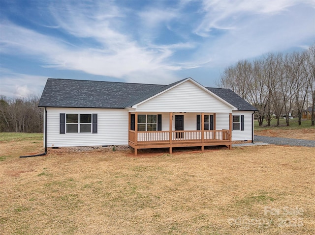 view of front of property with crawl space, a porch, a front yard, and roof with shingles