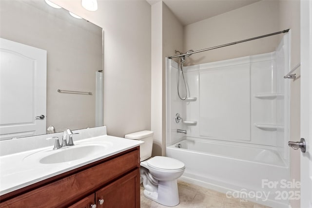 bathroom with tile patterned floors, shower / washtub combination, toilet, and vanity