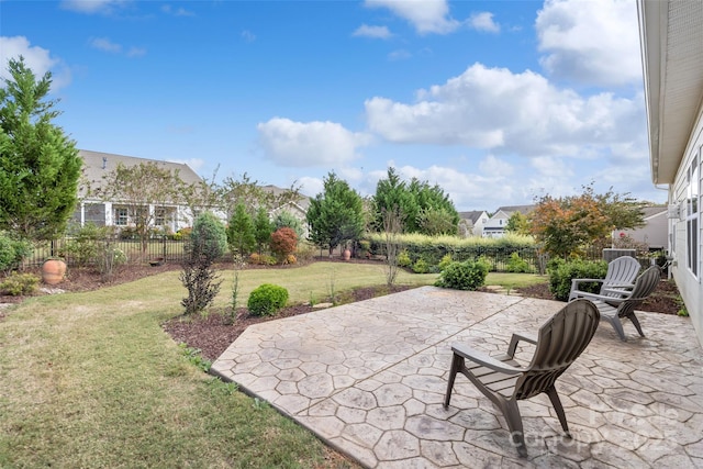 view of patio / terrace featuring fence