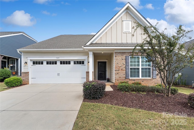 view of front of property with brick siding, board and batten siding, concrete driveway, and an attached garage