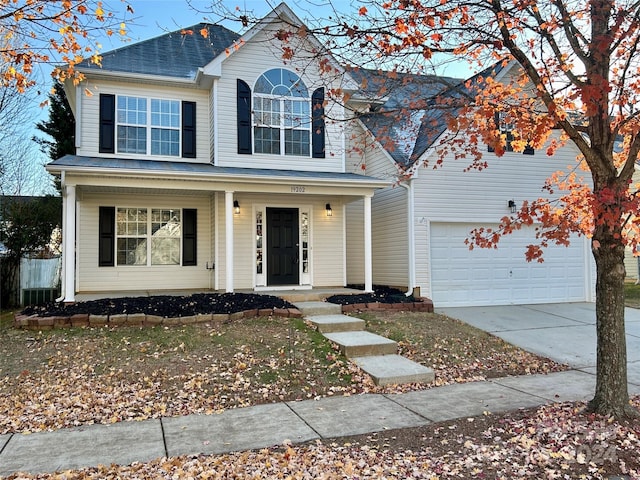 front of property featuring a garage